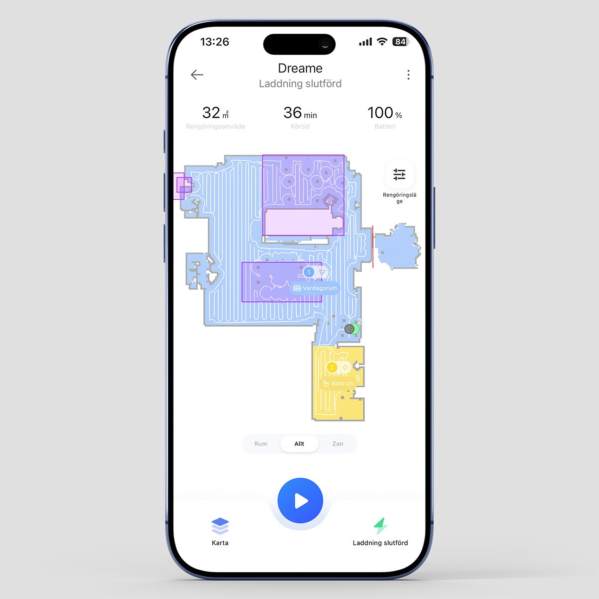 Smartphone visar karta i app för robotdammsugare med färgmarkerade rum och rengöringsinformation.