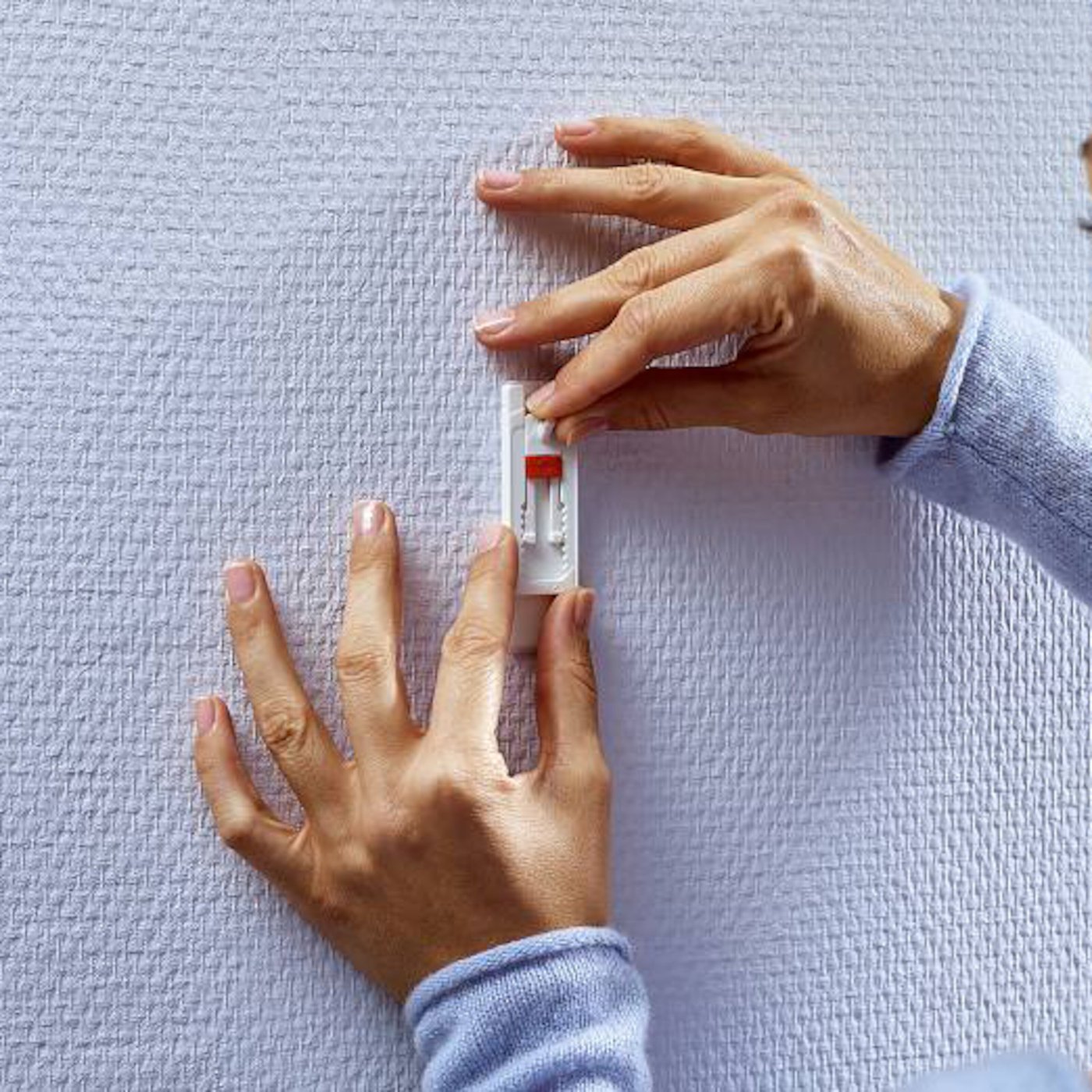 Tesa Justerbar limspiker for tapet og gips 1 kg 2-pk.