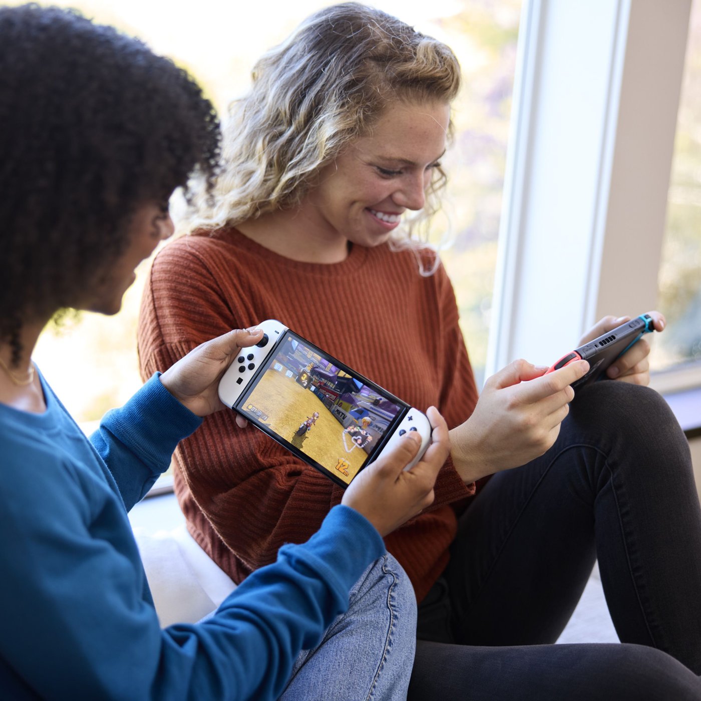 Nintendo Switch (OLED) Spelkonsol 7” Röd/Blå